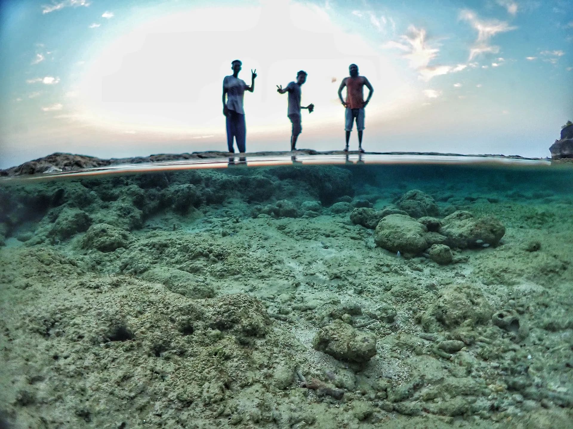 Underwater Olympus shoot — couple in clear Havelock water